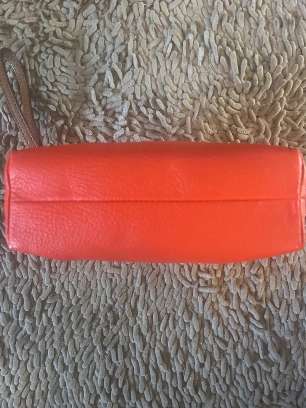 Michael Kors two-tone white and coral leather wristlet